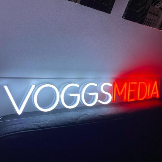 Voggs Media neon logo sign